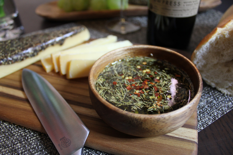 Simple Herb and Olive Oil Dip Featuring Acacia Wood Bowl and Cheese Board